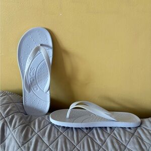 CROCS Women's Light Lilac Flip Flops, worn once.  In great condition,